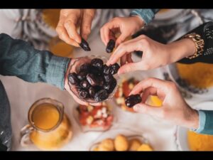 People sharing food around a table